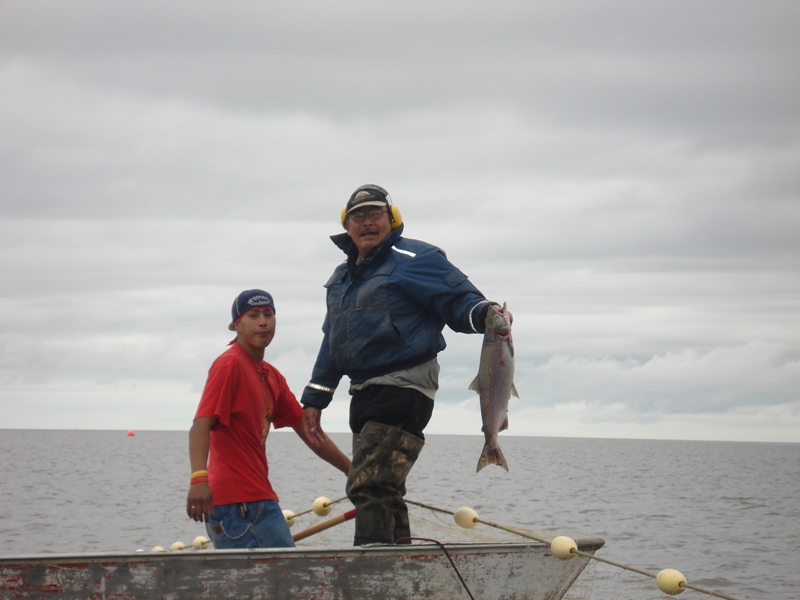Father and son fishing for salmon