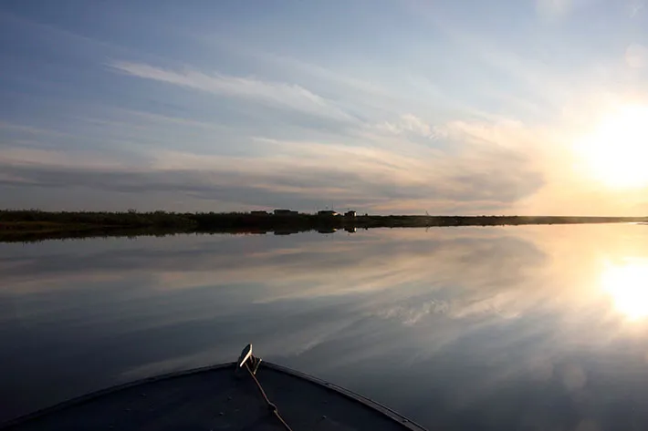 In August 2012, Snowchange Cooperative delegates travelled 1500 kilometers with the open boat on Kolyma River and East Siberia Sea to review the situation with the panels.