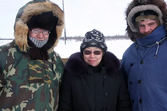 From left, Chief Vyacheslav Shadrin, Maria Krivashapkina (solar panel expert) and monitoring coordinator Chris Madine in the village of Kolymskaya, March 2014.