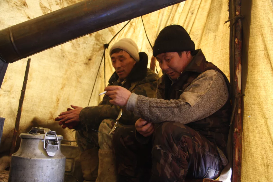 Vladimir Kolesov rests inside the Reindeer Brigade 4 camp