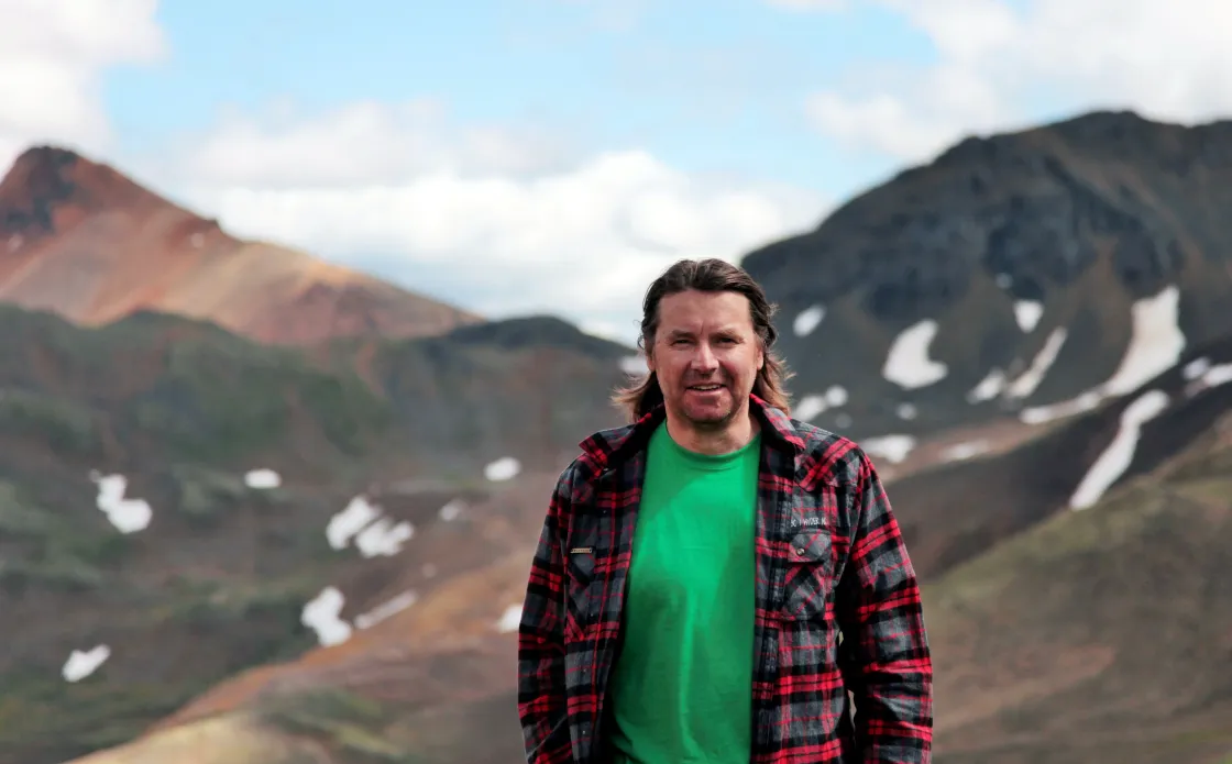 Curtis in front of mountain range