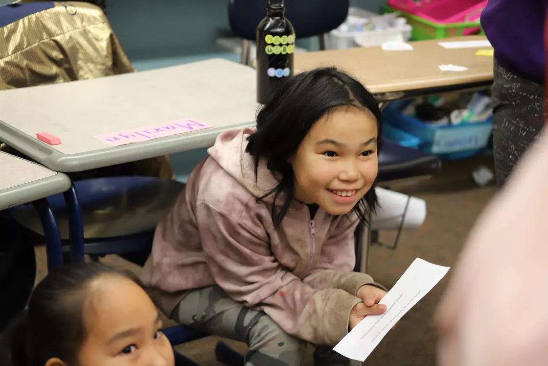 Student listens to Elder