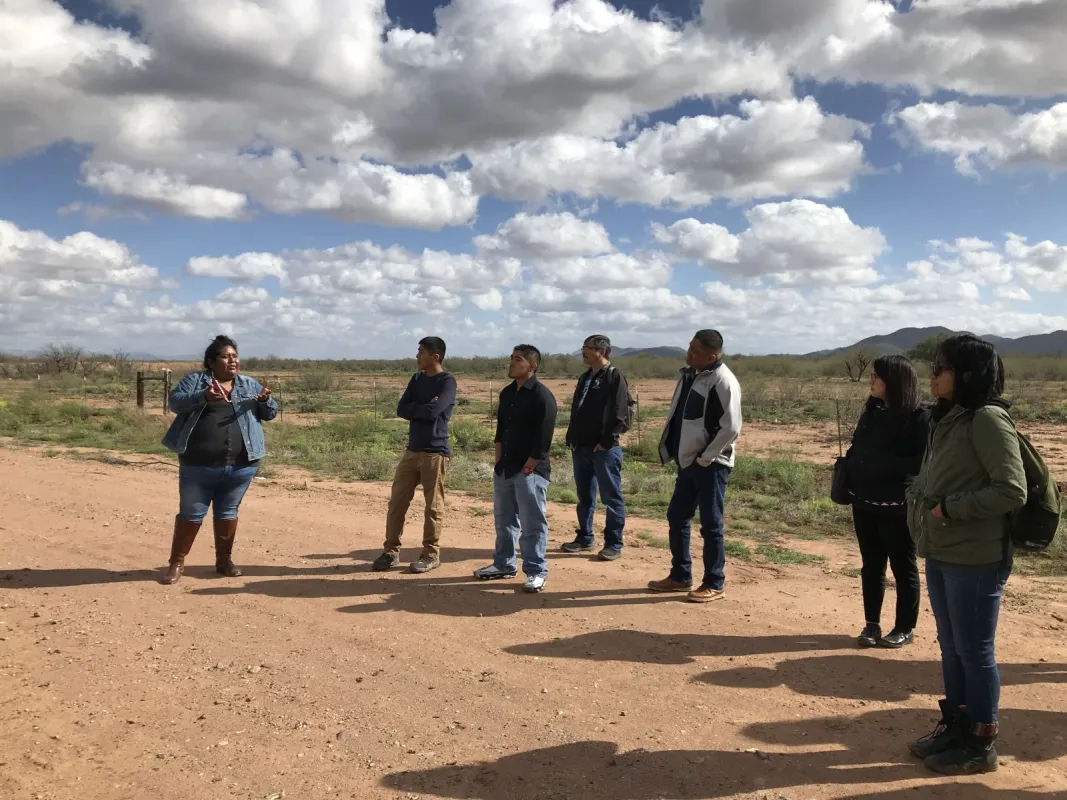 Our host and IFKN Steering Committee member Amy Juan welcomes the group to Tohono O'odham Community Action farm.