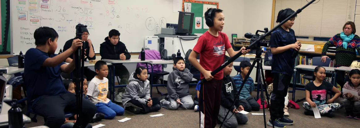 Children shoot a video in Chevak classroom