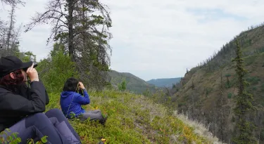Members look out onto mountain